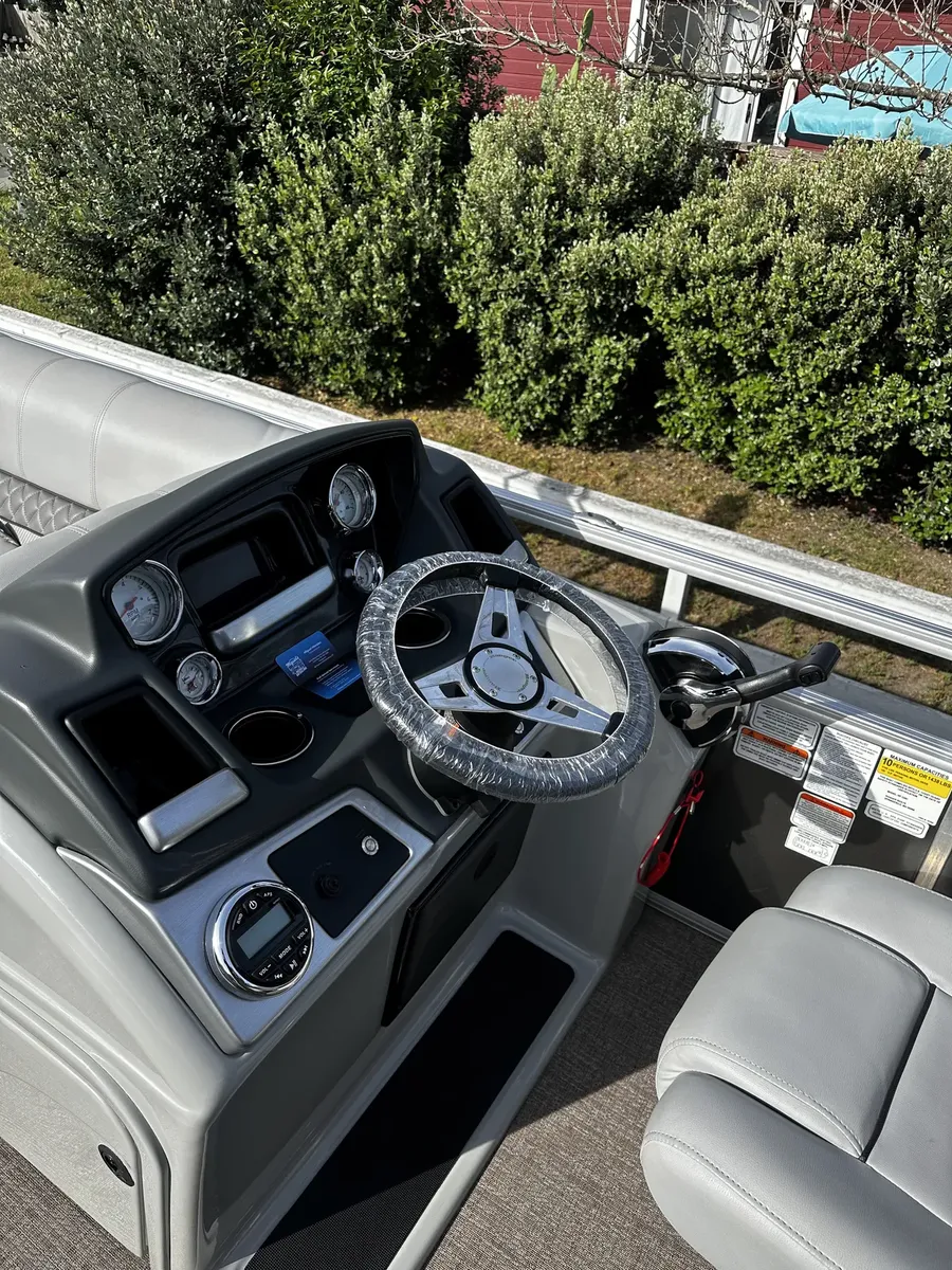 pontoon boat helm and console cleaned during a boat detail