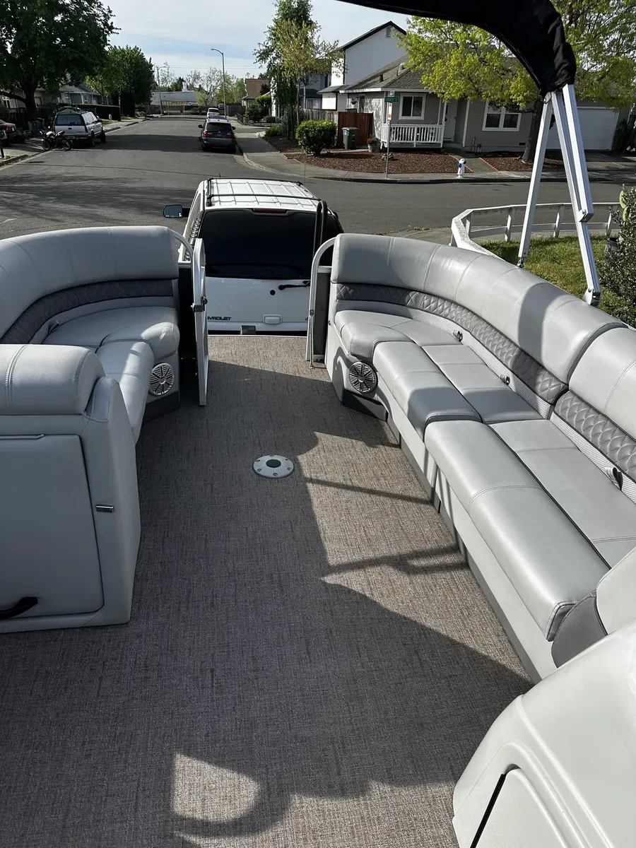 pontoon boat seating and flooring cleaned during a detail