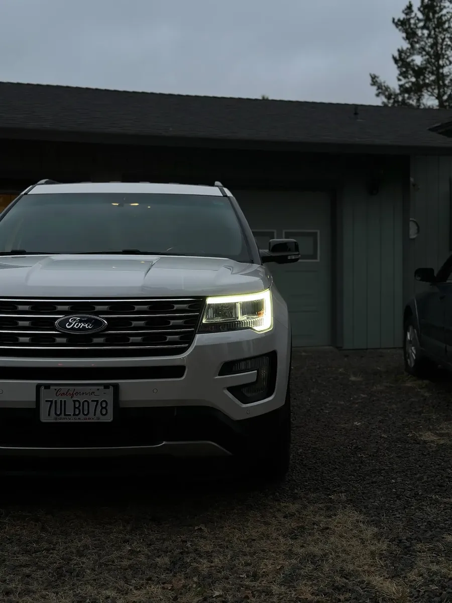 vehicle front end and headlights after exterior detailing and restoration