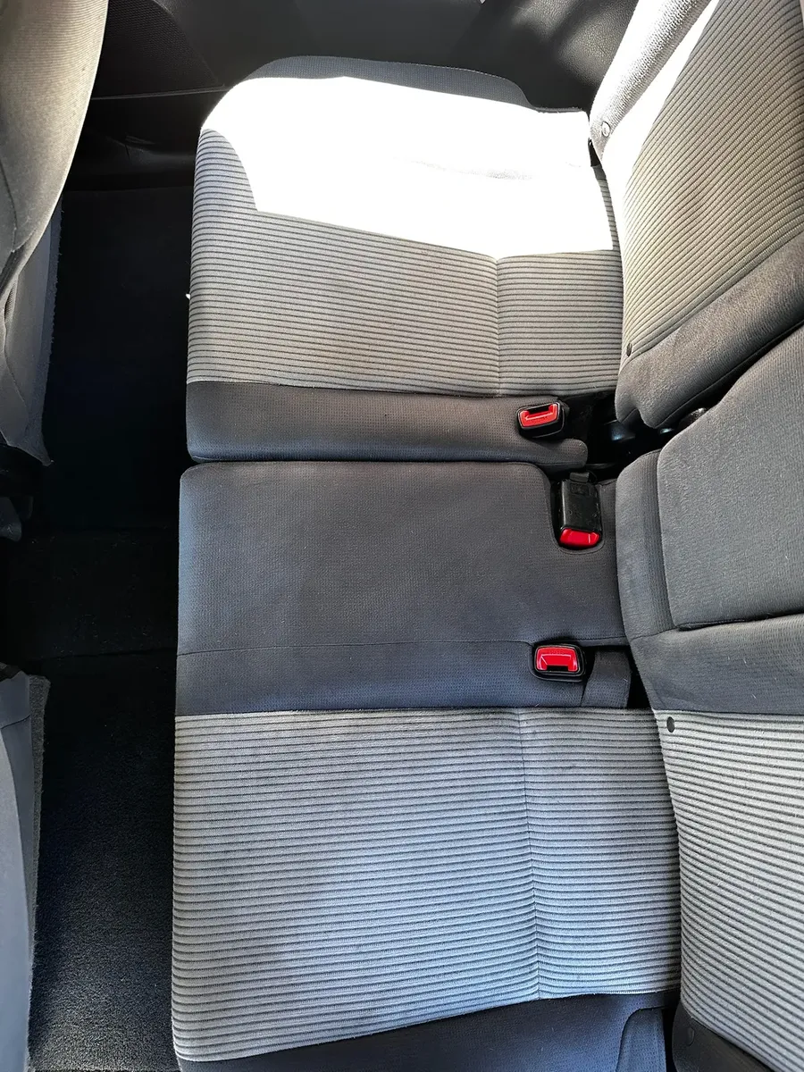 clean vehicle seats and carpet after interior odor treatment