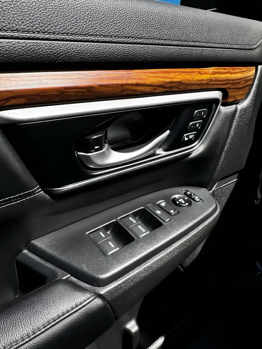 interior door armrest and trim cleaned during detailing