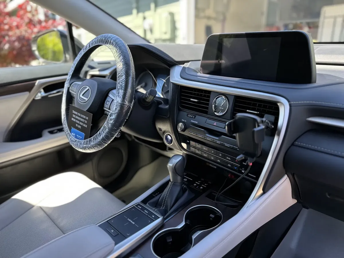 Lexus RX steering wheel and dashboard cleaned after detailing
