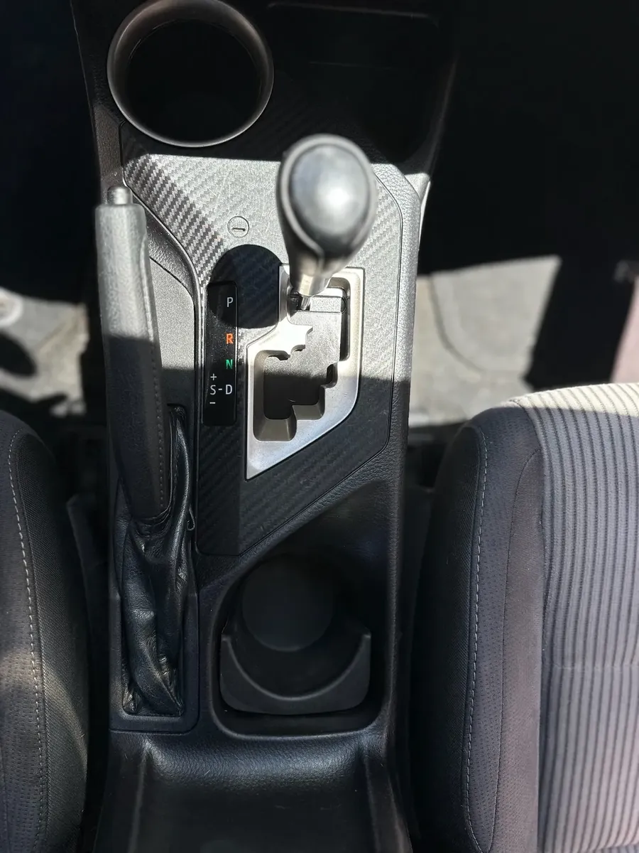 center console and gear shifter cleaned during interior detailing